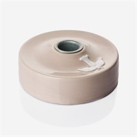 Rosa dopljusstake i keramik med en vit duva